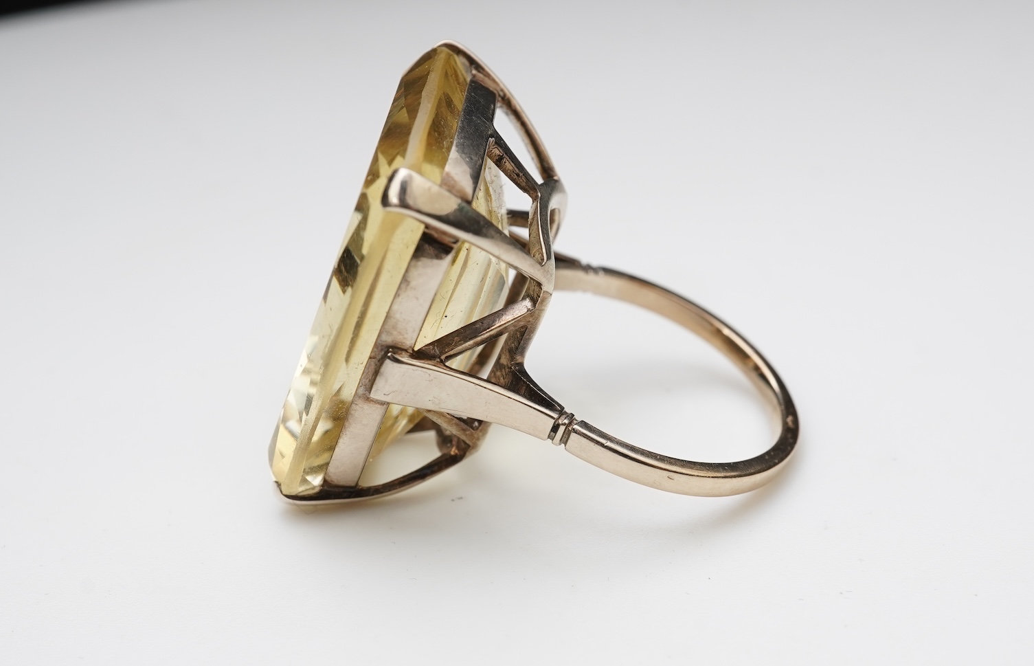 A collection of citrine jewels and a paste bracelet